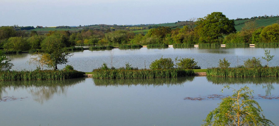 Lemington Lakes - scene in Beneath, book 1 Moreton Scientific Investigation by Rob Nesbitt